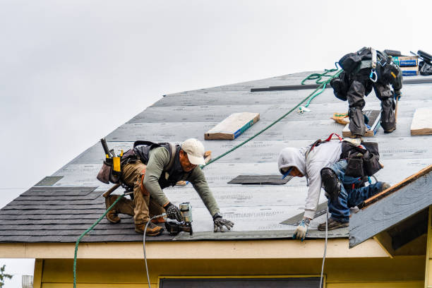 Professional Roofing technician working in College Point, NY